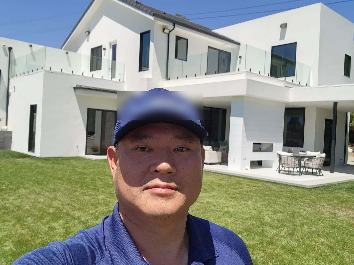 John on the roof of a modern estate
